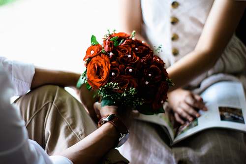 flower arrangement man holding red bouquet of flowers blossom